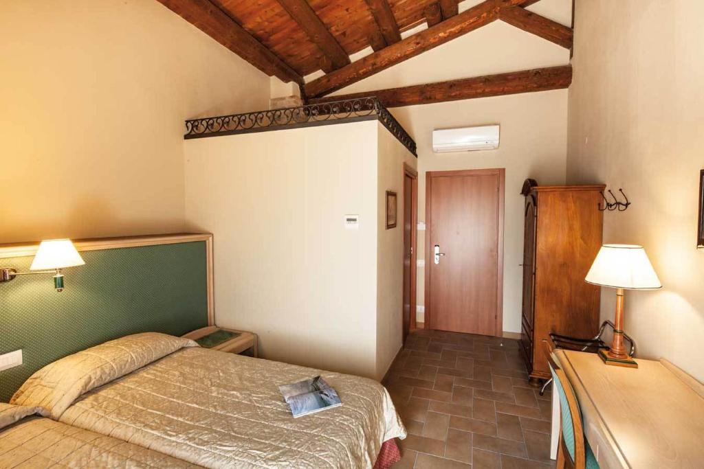 Hotel Residence Diamantina Ferrara Pokoj fotografie